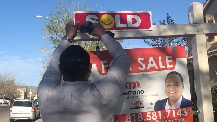 Marlon helping a family get their dream home